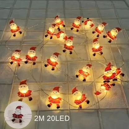 Guirnalda de luces LED de 2 m con 20 LED de Papá Noel y copos de nieve para decoración navideña del hogar. Ideal para adornar el árbol de Navidad o como regalo para niños. Año Nuevo 2025.