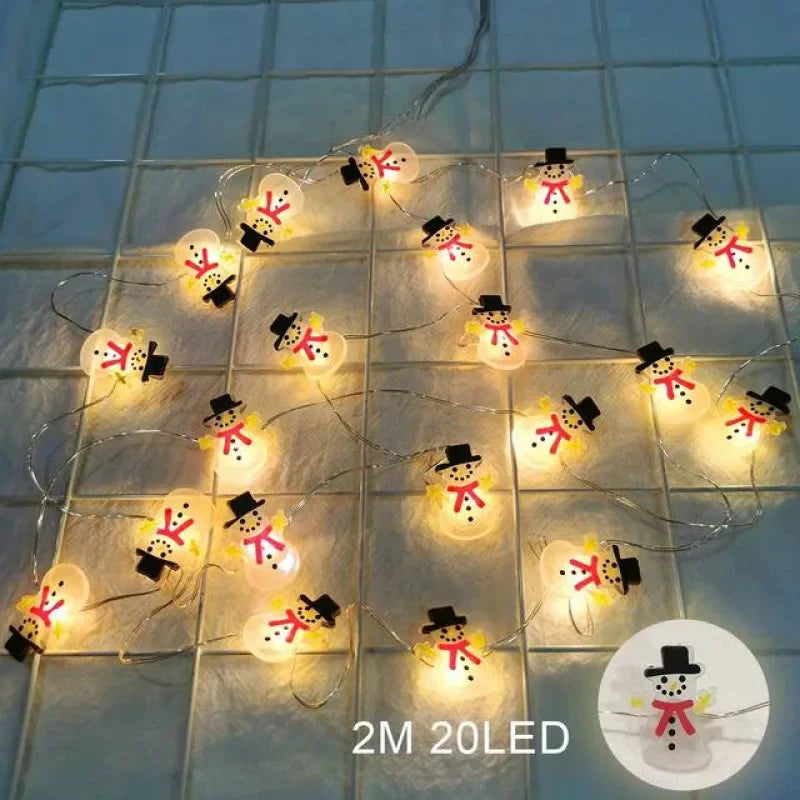Guirnalda de luces LED de 2 m con 20 LED de Papá Noel y copos de nieve para decoración navideña del hogar. Ideal para adornar el árbol de Navidad o como regalo para niños. Año Nuevo 2025.