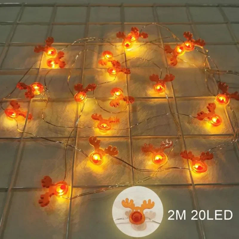 Guirnalda de luces LED de 2 m con 20 LED de Papá Noel y copos de nieve para decoración navideña del hogar. Ideal para adornar el árbol de Navidad o como regalo para niños. Año Nuevo 2025.